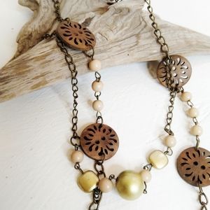 Beaded Necklace Wood cut Beads and shiny elements